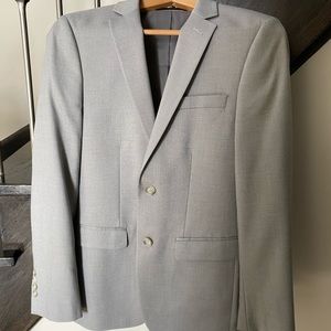 Light grey men’s suit jacket. size 38 regular.